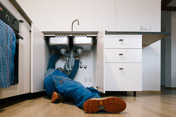 Professional Plumbing technician working in Sand Lake, NY
